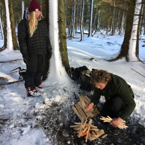 Ghillie's children, Yazzie & Zeki, building a fire to cook on outside